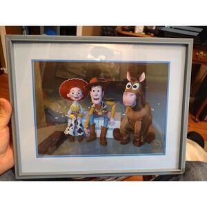Framed Toy Story Print Featuring Woody, Jessie, and Bullseye